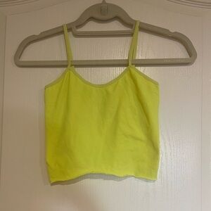 dELiA’s neon yellow cropped tank top​​​​​​